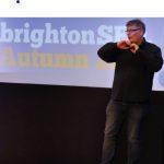 Dixon Jones on a speaking stage in Brighton